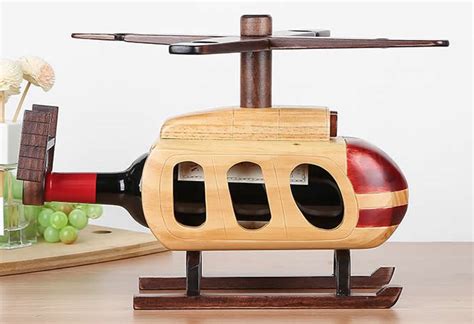 Check out our wooden glass holder selection for the very best in unique or custom, handmade pieces from our there are 4221 wooden glass holder for sale on etsy, and they cost 25,00 $ on average. Wooden Helicopter Wine Bottle Holder Wine Glass Holder ...