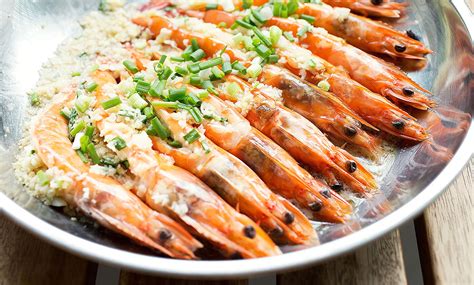 Fill each prawn cavity with the garlic mixture. Recipes - Steamed Garlic Prawns | FairPrice