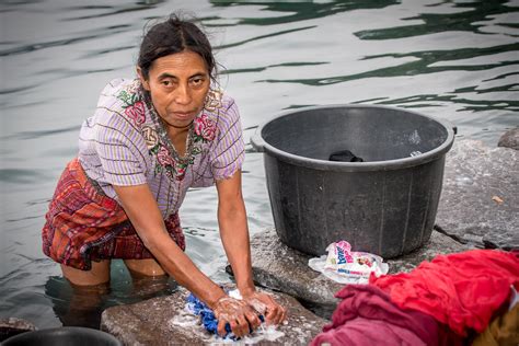 Guatemalan Maya Woman Washing Clothes In Lake Atitlán A Photo On