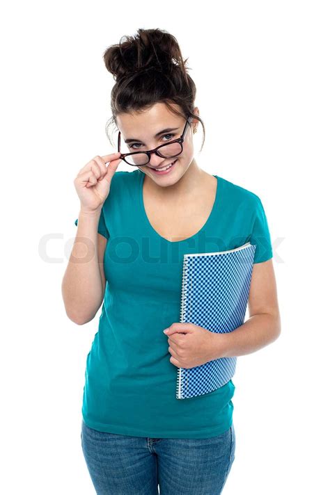 Pretty Girl Taking Off Her Glasses To Watch You Closely Stock Image Colourbox