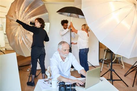 Photographer Team And Model At The Photo Shoot Stock Photo Image Of