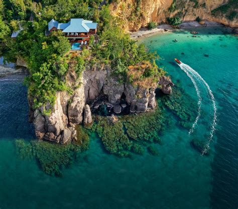 dominica s citizenship approved secret bay wins 2020 s world s best resort in the caribbean