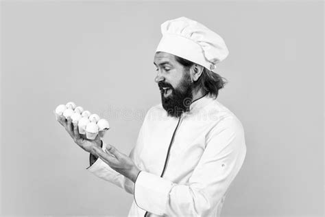 Happy Baking Using Eggs Concept Of Housekeeping Mature Bearded Man