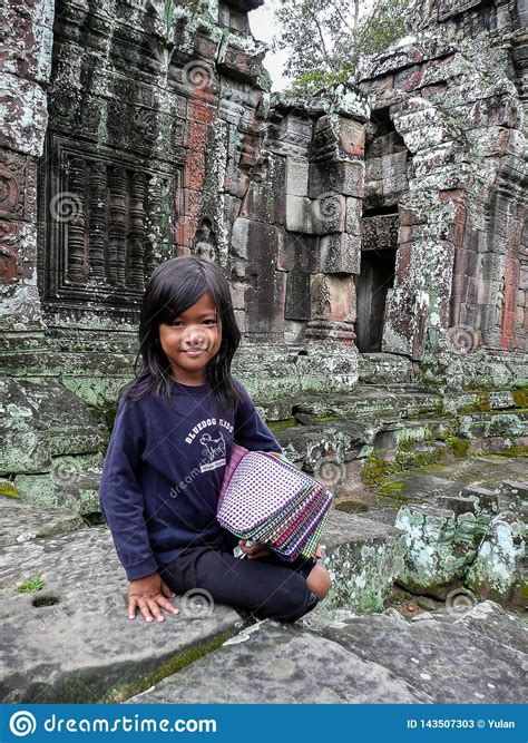 Smiling Young Girl Is Selling Fabrics As Souvenir Angkor Wat Cambodia