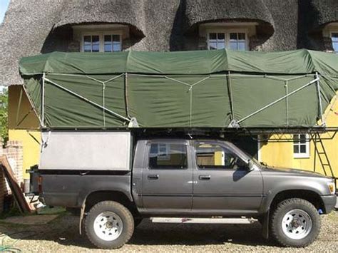 Cut a sheet of 1/2″ plywood to fit. This is awesome! Homemade Rooftop sleeps 4 - Expedition Portal | Truck tent, Camping, Roof tent