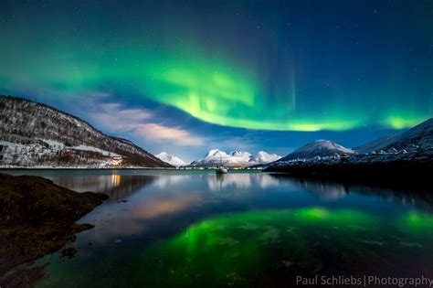 Expose Nature Northern Lights Over The Fjords Near Tromso Norway