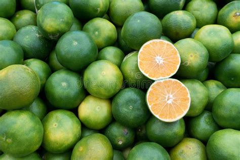 Fresh Juicy Green Mandarin Heap On Market Stall Stock Image Image Of