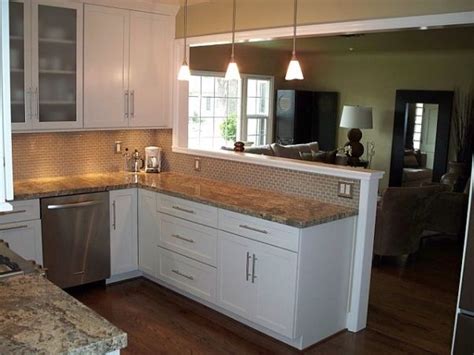The next idea is available in this photo of an open style eclectic if your open kitchen and dining room is large enough, you can build a larger half wall for defining both spaces. knock out wall kitchen dining | Knock out part of the wall ...