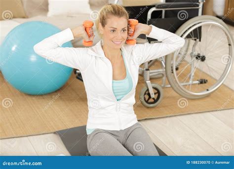 Young Pretty Woman Exercising At Home Stock Photo Image Of Discipline
