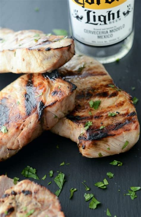 Cooking this lean cut of meat can be intimidating because there's a very small window between perfectly done and overcooked. Corona Grilled Pork Chops | Carrie's Experimental Kitchen