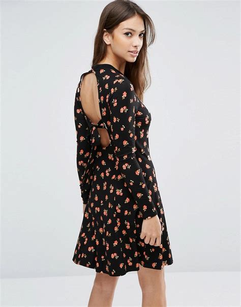 Image 1 Of ASOS Mini Skater Dress In Ditsy Floral With Open Back Mini