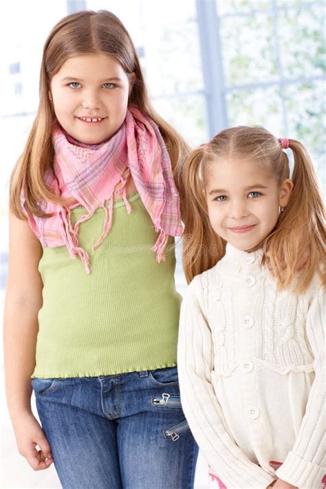 Portrait Of Little Sisters Smiling Stock Image Image Of Girl Casual