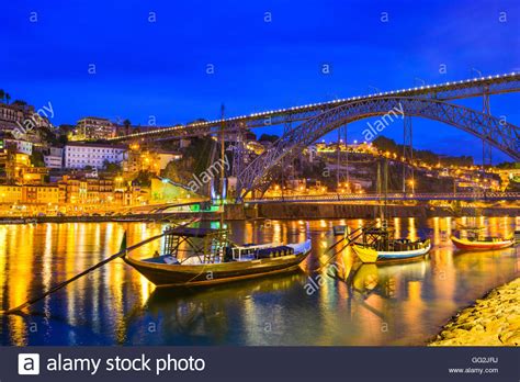 Porto Portugal Old Town Skyline On The Douro River With Rabelo Boats