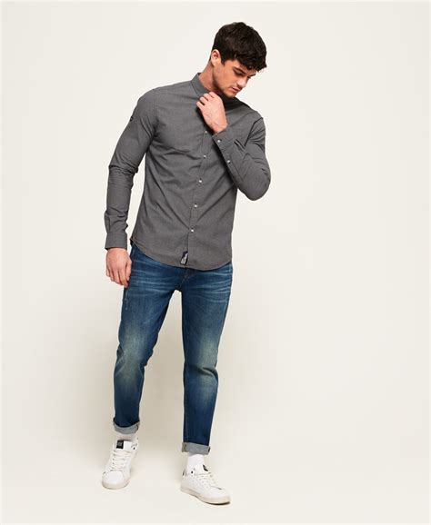 Smart casual is an ambiguously defined western dress code that is generally considered casual wear but with smart (in the sense of well dressed) components of a proper lounge suit from traditional informal wear. The Smart Casual Guide for Men | Superdry Edit