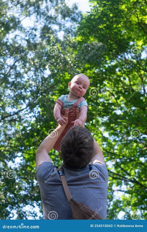 Portrait Of Young Father Hugging His Little Daughter Stock Image