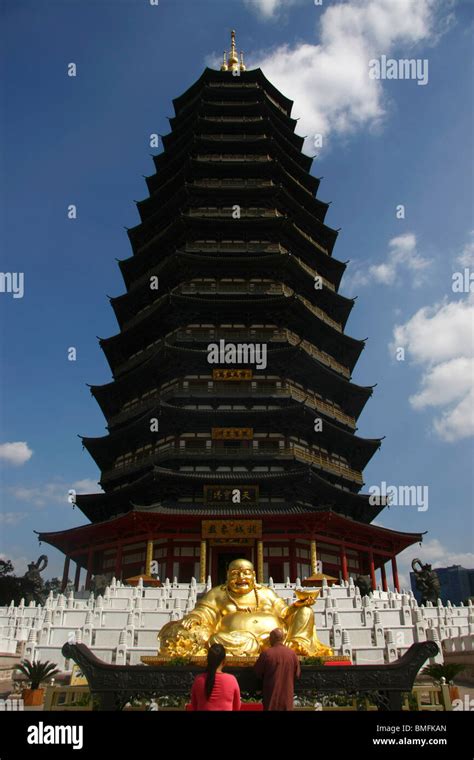 Gilded Statue Of Maitreya In Front Of Tianning Pagoda Tianning Temple