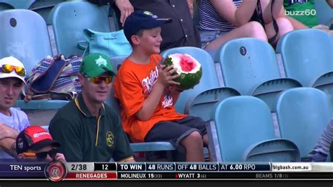 This Kid Trying To Eat An Entire Watermelon Is Winning The Internet