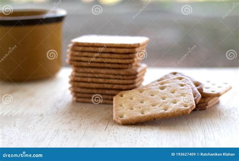 Milk Cracker Cookies Served With Hot Coffee On Wooden Desk Time Break