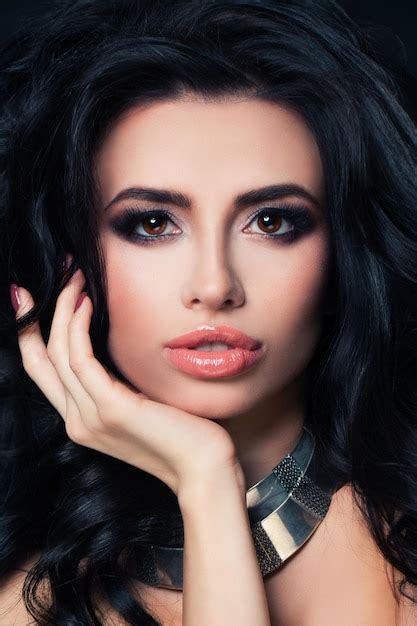 premium photo beautiful lady with dark curly perfect brunette with event makeup and permed