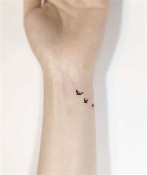 Simple Bird Tattoo Wrist