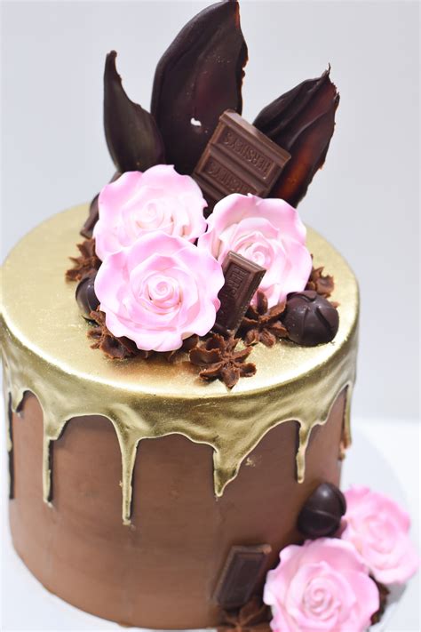 elegant chocolate drip cake with flowers rose gold drip with fresh florals chocolate drip cake
