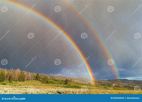 Double Rainbow In The Field Stock Photography 59771618