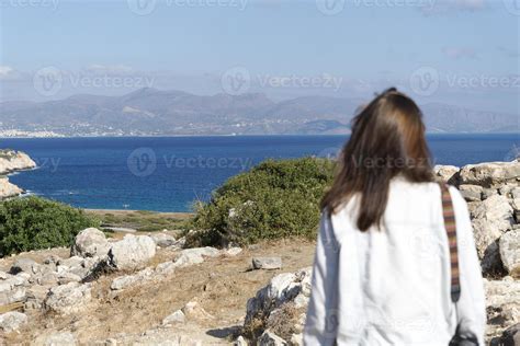The Woman Stands And Looks At The Sea And The Mountains 5124308 Stock