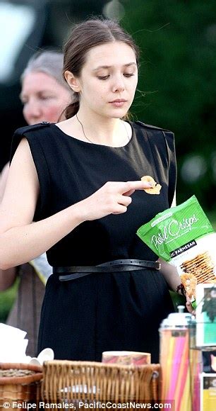 Elizabeth Olsen Snacks On Pretzel Crisps During Filming Break As