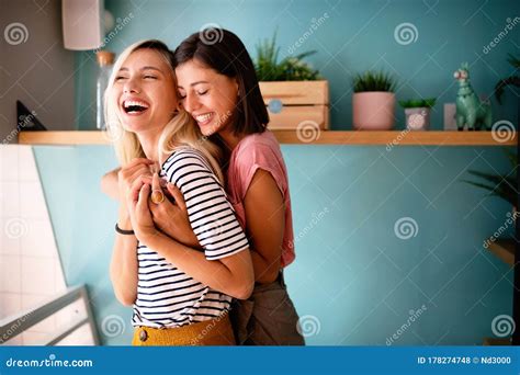 Cheerful Lesbians Embrace Passioantely And Have Fun Together Stock Photo Image Of Happy
