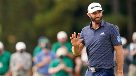 Dustin Johnson Waves In Celebration After Winning On The No 18 Green