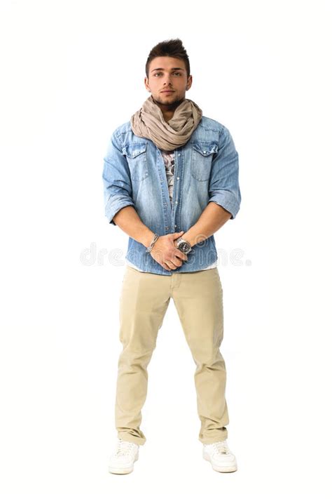 Handsome Young Man Standing With Denim Shirt And Scarf