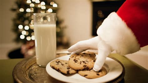 Santa Eating Cookies Stock Photos Pictures And Royalty Free Images Istock