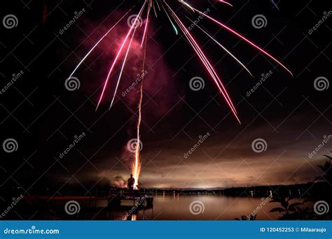 Fireworks Over Lake In Beautiful Landscape Stock Image Image Of Night
