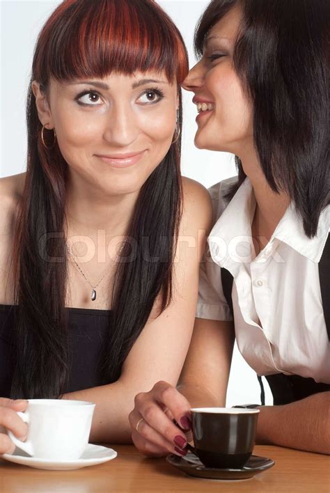 two girls drinking stock image colourbox