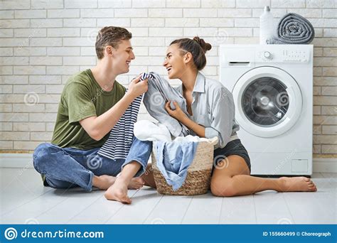 Loving Couple Is Doing Laundry Stock Image Image Of Life Domestic