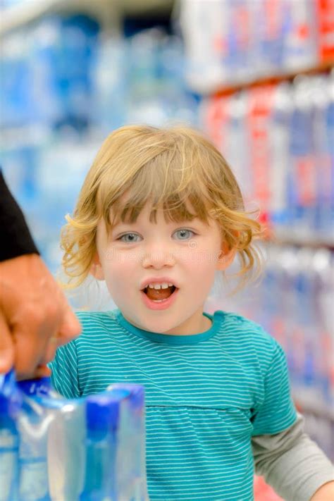 Cute Little Girl In Shopping Cart Happy To Shop In Supermarket Stock