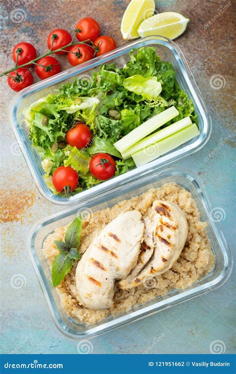 Healthy Meal Prep Containers With Quinoa Chicken Breast And Green Salad Overhead Shot Top View
