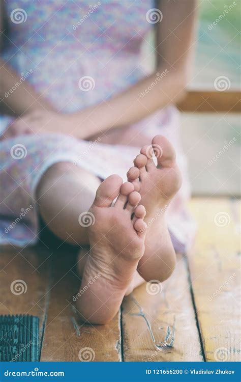 Boy S Feet On Bed Close Up Boy Lying On Bed And Reading A Book Royalty Free Stock Photo