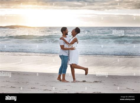 Playful African American Couple Spending A Day At The Sea Together