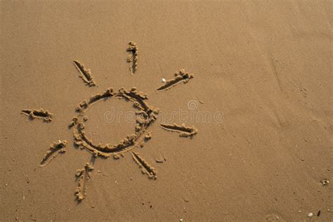 Vacation On The Sand Beach Concept The Sun Symbol Sunshine Drawing Into The Sand On The Beach