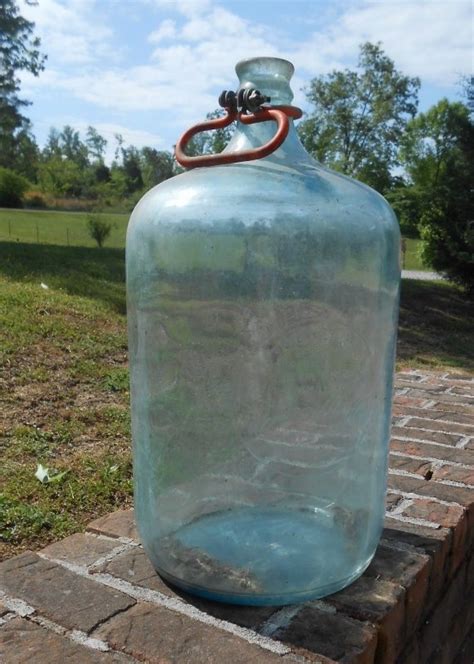 Upcycling An Old Glass Water Bottle Diy Inspired