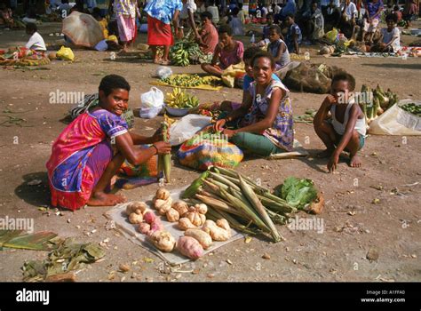 Women Selling Bananas And Vegetables At A Market In Madang Papua New