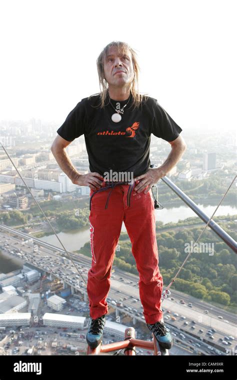 French Urban Climber Alain Robert Scaled The 242 Meter Federation Tower