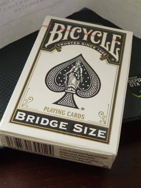 What size are playing cards? Bicycle rider back bridge size black playing cards deck