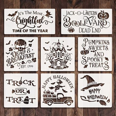 Six Halloween Stencils Are Shown On A Wooden Surface With Pumpkins