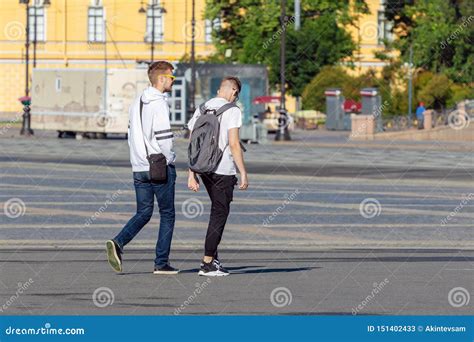 Two Young Men Walking Down The Street Editorial Stock Photo Image Of