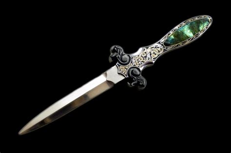 Intricately Designed Dagger With Green Stone