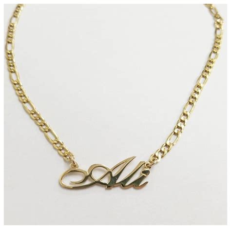 14k gold name necklace · in gold we trust · online store powered by storenvy
