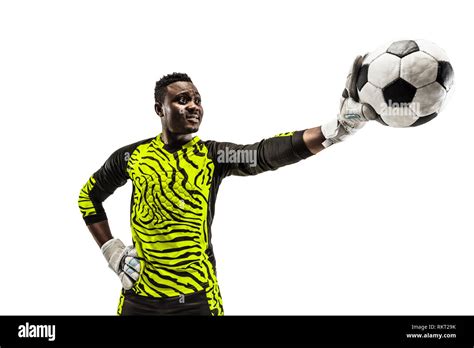 One African Male Soccer Player Goalkeeper Standing And Holding Ball