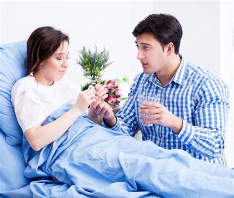 The Caring Loving Husband Visiting Pregnant Wife In Hospital Caring Loving Husband Visiting